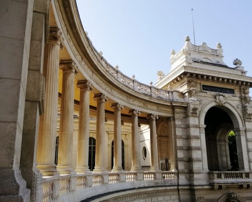 The Palais Longchamp under a blue sky and sunlight in Marseille in France